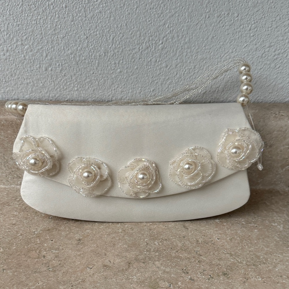 Elegant Cream Clutch with Pearl Accents